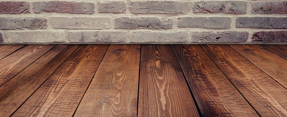 Dark varnished floorboards