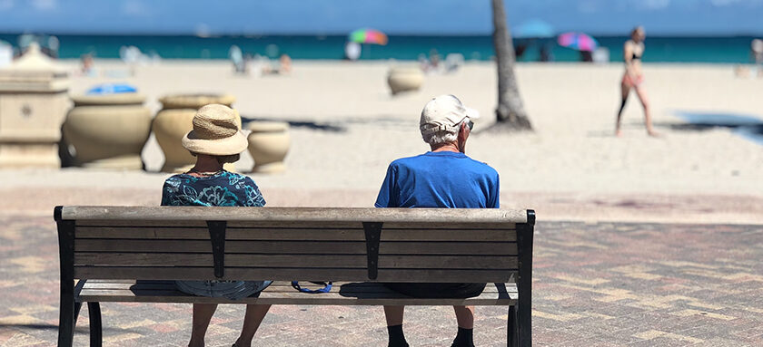 Elderly couple on a park bench