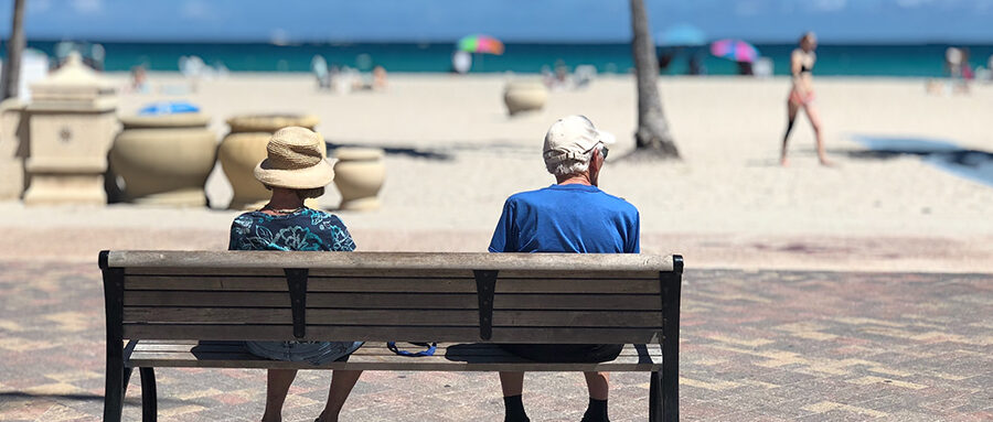 Elderly couple on a park bench