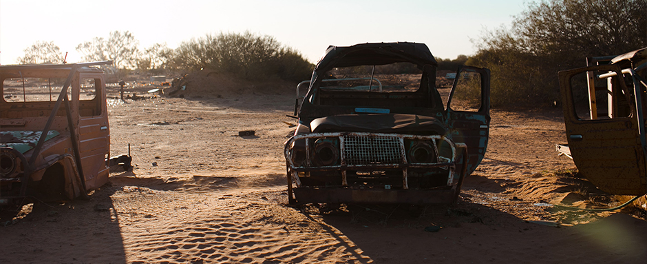 Old Crashed Car In A Junkyard