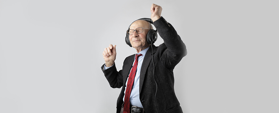 Retired man dancing to music