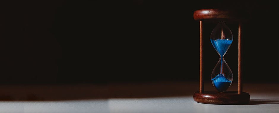 Sandtimer against black background