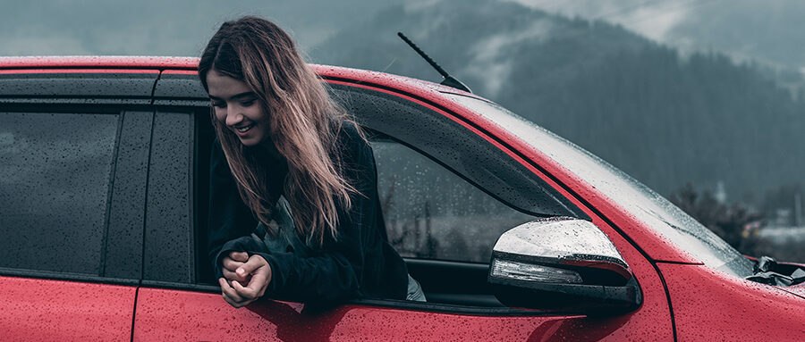 Teenager Driving A Car
