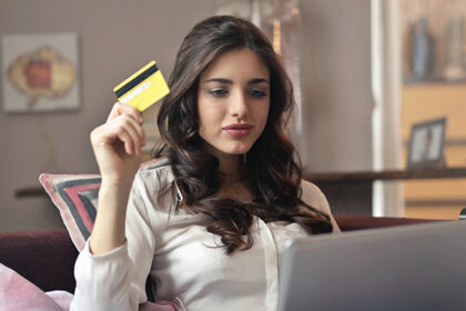 Woman spending with a credit card