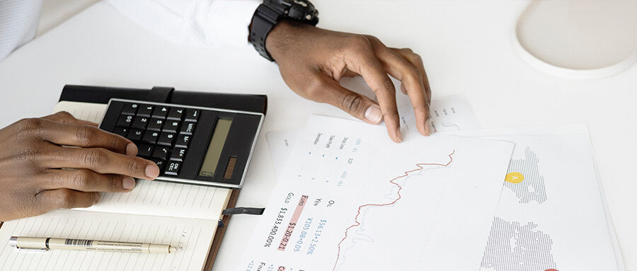 Man calculating bank charges